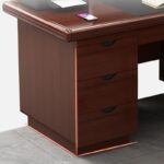 A sleek 140cm executive workstation made of high-quality wood and metal, featuring a spacious surface, ergonomic design, storage drawers, and cable management system.