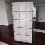A 15 Locker Office Cabinet with individual secure lockers, designed for organizing and protecting office documents, personal items, and supplies.