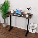 \An electric standing desk with a sleek design, featuring height-adjustable functionality, ideal for a modern workspace.