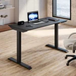 An electric standing desk with a sleek design, featuring height-adjustable functionality, ideal for a modern workspace.