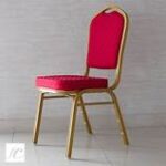Banquet conference seats arranged in a formal setting, featuring padded cushions and sleek designs.