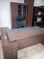 A modern 1.8-meter professional office desk crafted from high-quality wood and metal, featuring ample storage, an ergonomic design, and a cable management system.