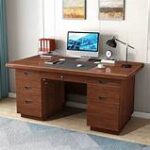 A sleek 140cm executive workstation made of high-quality wood and metal, featuring a spacious surface, ergonomic design, storage drawers, and cable management system.