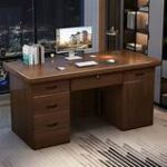 A sleek 140cm executive workstation made of high-quality wood and metal, featuring a spacious surface, ergonomic design, storage drawers, and cable management system.