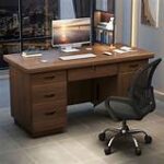 A sleek 140cm executive workstation made of high-quality wood and metal, featuring a spacious surface, ergonomic design, storage drawers, and cable management system.