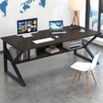 Computer desk with built-in shelf, spacious work surface, and additional storage for office essentials.
