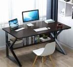 Computer desk with built-in shelf, spacious work surface, and additional storage for office essentials.