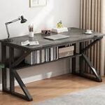 Computer desk with built-in shelf, spacious work surface, and additional storage for office essentials.