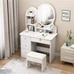 White vanity dressing table with large mirror and storage drawers for makeup and accessories.