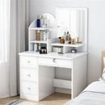 White vanity dressing table with large mirror and storage drawers for makeup and accessories.