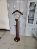 Elegant mahogany office coat hanger with multiple hooks for outerwear storage