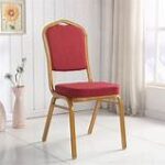 Banquet conference seats arranged in a formal setting, featuring padded cushions and sleek designs.