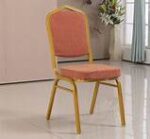 Banquet conference seats arranged in a formal setting, featuring padded cushions and sleek designs.