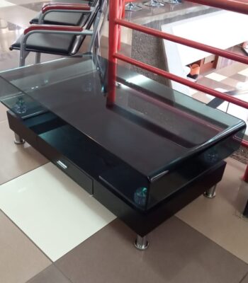 A luxurious VIP Lounge Table crafted from premium materials, featuring a sleek design with a polished wood or glass surface, perfect for upscale settings.