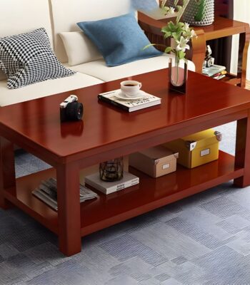 Business office coffee table with a sleek design, premium material, and lower shelf for storage, placed in a modern office setting.