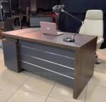 1.8-meter office desk with a spacious work surface, storage drawers, and a sleek, modern design.