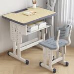 Kid's desk and chair set designed for children with adjustable features and storage compartments.