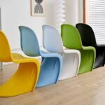 Vitra Panton Eames Chair in vibrant color with a smooth, sculptural design, showcasing its iconic modern style.