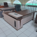 A luxurious 1600mm Boss Executive Office Table made from solid wood, metal, and premium veneers, featuring a spacious surface, built-in storage, and a sleek, professional design.