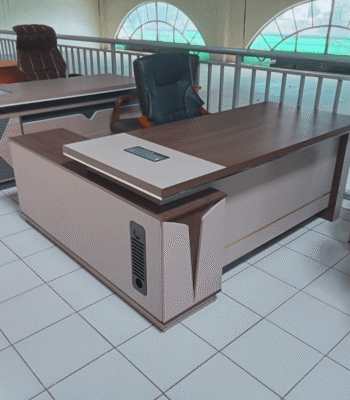 A luxurious 1600mm Boss Executive Office Table made from solid wood, metal, and premium veneers, featuring a spacious surface, built-in storage, and a sleek, professional design.