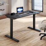An electric standing desk with a sleek design, featuring height-adjustable functionality, ideal for a modern workspace.
