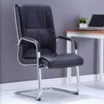 Comfortable and stylish executive visitor seat in a professional office setting.
