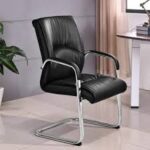 Comfortable and stylish executive visitor seat in a professional office setting.