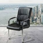 Comfortable and stylish executive visitor seat in a professional office setting.