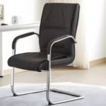 Comfortable and stylish executive visitor seat in a professional office setting.