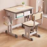 Kid's desk and chair set designed for children with adjustable features and storage compartments.