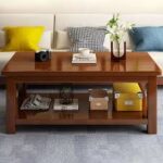 Modern solid wood coffee table with clean lines and natural wood finish, perfect for contemporary living spaces.