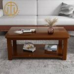Modern solid wood coffee table with clean lines and natural wood finish, perfect for contemporary living spaces.
