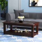 Modern solid wood coffee table with clean lines and natural wood finish, perfect for contemporary living spaces.