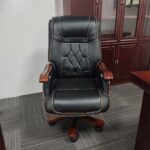 High-Back Executive Office Chair with ergonomic design, adjustable features, and plush padding, providing comfort and support for long hours.