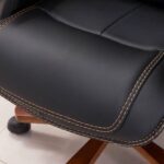 High-Back Executive Office Chair with ergonomic design, adjustable features, and plush padding, providing comfort and support for long hours.