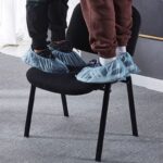 Black Office Conference Chair with ergonomic design, cushioned seat, and armrests, perfect for meetings and professional environments.