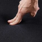 Black Office Conference Chair with ergonomic design, cushioned seat, and armrests, perfect for meetings and professional environments.