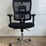 Black Mesh Headrest Office Chair with adjustable headrest, lumbar support, and padded armrests, designed for comfort and ergonomic support.