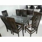 Elegant 6-seater dining table with a spacious design, crafted from high-quality materials for durability and style, perfect for family meals and gatherings.