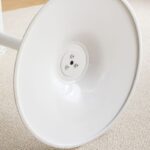 A modern round office dining table, designed for professional settings, offering a sleek and functional space for dining or meetings.