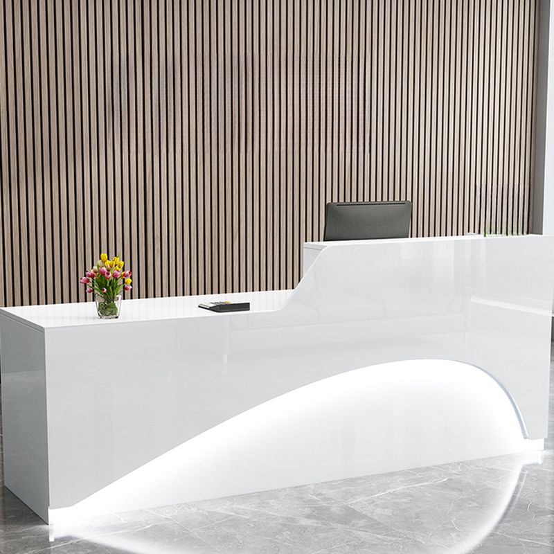 120cm White Reception Desk 120cm White Reception Desk with modern design, ample workspace, and built-in storage for a professional office environment.