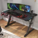 gaming desk, gaming desks, gaming desk for sale, buy gaming desk, gaming desk price, gaming desk Kenya, gaming desk Nairobi, affordable gaming desk, cheap gaming desk, luxury gaming desk, best gaming desk, top rated gaming desk, modern gaming desk, professional gaming desk, ergonomic gaming desk, adjustable gaming desk, height adjustable gaming desk, electric gaming desk, sit stand gaming desk, RGB gaming desk, LED gaming desk, gaming desk with RGB lights, gaming desk with LED lights, gaming desk with light strip, L shaped gaming desk, corner gaming desk, small gaming desk, large gaming desk, wide gaming desk, long gaming desk, compact gaming desk, gaming computer desk, PC gaming desk, gamer desk, esports gaming desk, pro gamer desk, streaming desk, gaming setup desk, gaming workstation desk, heavy duty gaming desk, durable gaming desk, strong gaming desk, steel frame gaming desk, carbon fiber gaming desk, wooden gaming desk, MDF gaming desk, gaming desk with cable management, gaming desk with headphone hook, gaming desk with cup holder, gaming desk with monitor stand, gaming desk with keyboard tray, gaming desk with storage, gaming desk with drawers, gaming desk with shelves, minimalist gaming desk, black gaming desk, white gaming desk, red gaming desk, blue gaming desk, custom gaming desk Kenya, gaming desk supplier Kenya, gaming desk showroom Nairobi, gaming desk online shop Kenya, gaming desk delivery Kenya, best gaming desk price Kenya, gaming desk near me, affordable gaming desk Nairobi, premium gaming desk Kenya, imported gaming desk Kenya, gaming table for gamers, gaming office desk, gaming study desk, home gaming desk, bedroom gaming desk, gaming desk for small room, gaming desk for large room, gaming desk for dual monitors, gaming desk for triple monitors, gaming desk for PS5, gaming desk for Xbox, gaming desk for PC setup, gaming desk with mouse pad surface, gaming desk with full mouse pad, scratch resistant gaming desk, waterproof gaming desk, easy assembly gaming desk, sturdy gaming desk, gaming desk with metal legs, gaming desk with T frame, gaming desk with Z frame, gaming desk with adjustable feet, gaming desk for streaming setup, gaming desk for content creators, professional streaming desk, gaming desk with power outlet, gaming desk with USB port, gaming desk with built in socket, high performance gaming desk, competitive gaming desk, tournament gaming desk, gamer workstation table, gaming desk for office use, gaming desk Kenya best seller, gaming desk deals Nairobi, gaming desk offers Kenya, gaming desk discounts Kenya, gaming desk clearance sale, executive gaming desk, stylish gaming desk, contemporary gaming desk, space saving gaming desk, compact RGB gaming desk, large L shaped gaming desk, corner RGB gaming desk, gaming desk with raised shelf, gaming desk with monitor riser, gaming desk for teens, gaming desk for adults, gaming desk for students, gaming furniture Kenya, gamer furniture Nairobi, pro gaming table Kenya, gaming desk wholesale Kenya, bulk gaming desk supplier Kenya, high quality gaming desk, heavy duty gamer desk, modern esports desk, gaming desk for home office, dual purpose gaming desk, gaming desk for work and play, ergonomic RGB gaming desk, premium gaming workstation, smart gaming desk, adjustable height gamer desk, gaming desk with cable tray, gaming desk with CPU holder, gaming desk with storage rack, gaming desk with side shelf, gaming desk with LED controller, gaming desk with tempered glass top, ultra wide gaming desk, 120cm gaming desk, 140cm gaming desk, 160cm gaming desk, 180cm gaming desk, 2 meter gaming desk, gaming desk for studio apartment, gaming desk for professional gamers, budget gaming desk Kenya, high end gaming desk Kenya, gaming desk installment payment Kenya, gaming desk cash on delivery Kenya, custom made gaming desk Nairobi, gaming desk manufacturers Kenya, gaming desk distributors Nairobi, gaming desk furniture store Kenya, gaming desk showroom near me, modern gamer workstation Kenya, RGB corner gaming desk Kenya, affordable L shaped gaming desk Nairobi, durable metal gaming desk Kenya, professional streamer desk Kenya, ergonomic PC gaming table Kenya.