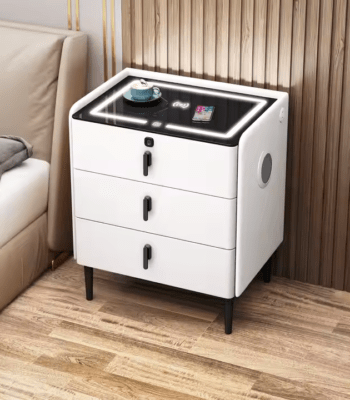 3 Drawers Smart Bedside Table Cabinet – Modern Bedroom Storage Solution The 3 Drawers Smart Bedside Table Cabinet is a stylish and practical furniture piece designed to enhance bedroom organization and convenience. It is ideal for storing personal items such as books, phones, chargers, medicines, and bedtime essentials. Because of its compact design, it fits perfectly beside beds in both small and large bedroom spaces. Moreover, this bedside cabinet combines modern aesthetics with smart storage functionality. As a result, it helps keep your bedroom neat, organized, and clutter-free while adding a touch of elegance to the interior. Spacious 3-Drawer Storage Design This bedside table features three well-structured drawers that provide ample storage space for everyday essentials. In addition, the drawers allow users to separate items for better organization and quick access. Furthermore, the smooth sliding mechanism ensures easy opening and closing without noise or effort. Therefore, it is highly convenient for nighttime use and daily bedroom routines. Smart and Functional Bedroom Design The smart design of this bedside cabinet focuses on maximizing storage while maintaining a compact footprint. Because of its space-saving structure, it is suitable for apartments, guest rooms, and master bedrooms. In addition, the top surface provides enough space for a bedside lamp, alarm clock, decorative items, or charging devices. Consequently, it enhances both functionality and bedroom aesthetics. Durable and Long-Lasting Construction This bedside table is built using high-quality engineered wood or MDF material designed for durability. Moreover, the strong structure ensures stability and long-term performance in everyday use. In addition, the surface is often scratch-resistant and easy to clean. Therefore, it maintains a fresh and polished look over time even with regular use. Modern and Elegant Bedroom Appearance The 3 Drawers Smart Bedside Table Cabinet features a clean and modern design that complements different bedroom styles. Because of its simple yet elegant finish, it blends easily with beds, wardrobes, and other bedroom furniture. Furthermore, it enhances the overall visual appeal of the room while maintaining practicality. As a result, it is both a decorative and functional addition to any bedroom. Key Features 3 spacious drawers for organized storage Compact and space-saving bedside design Smooth sliding drawer mechanism Durable engineered wood/MDF construction Scratch-resistant and easy-to-clean surface Modern and stylish bedroom appearance Stable structure for daily use Top surface for lamps and accessories Suitable for bedrooms, guest rooms, and apartments Perfect for Organized and Stylish Bedrooms The 3 Drawers Smart Bedside Table Cabinet is an excellent choice for anyone looking to improve bedroom organization while maintaining a modern look. It provides practical storage and enhances convenience for everyday living.
