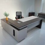 office table, office table kenya, office table nairobi, office desk table, office work table, modern office table, executive office table, wooden office table, metal office table, steel office table, L-shaped office table, corner office table, straight office table, adjustable office table, height adjustable office table, standing office table, ergonomic office table, computer office table, workstation office table, office study table, office writing table, office furniture table, office meeting table, office conference table, luxury office table, premium office table, affordable office table, cheap office table kenya, durable office table, heavy duty office table, stylish office table, contemporary office table, minimalist office table, industrial office table, Scandinavian office table, corporate office table, business office table, home office table, staff office table, manager office table, CEO office table, director office table, reception office table, office table with drawers, office table with storage, office table with shelves, office table with cabinet, office table with keyboard tray, office table with cable management, office table MDF, office table laminate finish, office table glass top, oak office table, walnut office table, mahogany office table, black office table, white office table, grey office table, compact office table, large office table, small office table, space saving office table, modular office table, foldable office table, portable office table, office table set, office workstation table set, office table furniture kenya, office table supplier kenya, office table showroom kenya