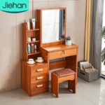 Modern Dressing Vanity Table – SEO Optimized Website Product Description Modern Dressing Vanity Table Enhance your bedroom with the Modern Dressing Vanity Table, a stylish and functional furniture piece designed to make your daily beauty routine more comfortable and organized. Whether you are getting ready for work, school, or a special occasion, this elegant vanity table provides a dedicated space for applying makeup, styling your hair, and storing your beauty essentials. Moreover, its contemporary design adds a touch of sophistication to bedrooms, apartments, hotels, and dressing rooms. Key Features Modern and elegant vanity table design Premium engineered wood construction Large mirror for convenient grooming and makeup application Spacious tabletop for cosmetics and beauty accessories Multiple storage drawers for organized storage Scratch-resistant laminated finish Strong and stable construction for long-lasting durability Smooth-gliding drawers with quality hardware Easy-to-clean and low-maintenance surface Compact design suitable for bedrooms and apartments Comfortable legroom for convenient seating Ideal for homes, apartments, hotels, and dressing rooms
