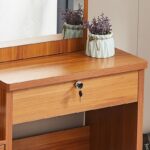 Modern Dressing Vanity Table – SEO Optimized Website Product Description Modern Dressing Vanity Table Enhance your bedroom with the Modern Dressing Vanity Table, a stylish and functional furniture piece designed to make your daily beauty routine more comfortable and organized. Whether you are getting ready for work, school, or a special occasion, this elegant vanity table provides a dedicated space for applying makeup, styling your hair, and storing your beauty essentials. Moreover, its contemporary design adds a touch of sophistication to bedrooms, apartments, hotels, and dressing rooms. Key Features Modern and elegant vanity table design Premium engineered wood construction Large mirror for convenient grooming and makeup application Spacious tabletop for cosmetics and beauty accessories Multiple storage drawers for organized storage Scratch-resistant laminated finish Strong and stable construction for long-lasting durability Smooth-gliding drawers with quality hardware Easy-to-clean and low-maintenance surface Compact design suitable for bedrooms and apartments Comfortable legroom for convenient seating Ideal for homes, apartments, hotels, and dressing rooms